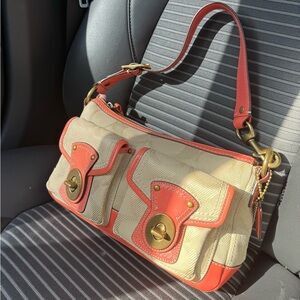 Vintage pink and tan Coach Legacy bag.